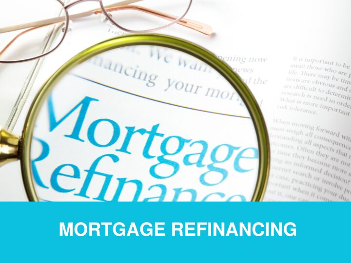 Magnifying glass over the word 'Mortgage Refinancing' on a document.